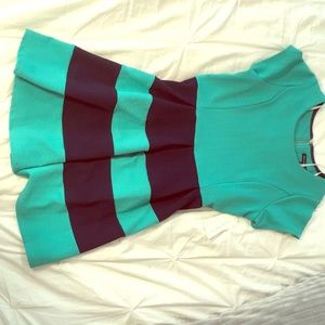 An aqua blue and dark navy dress for girls.